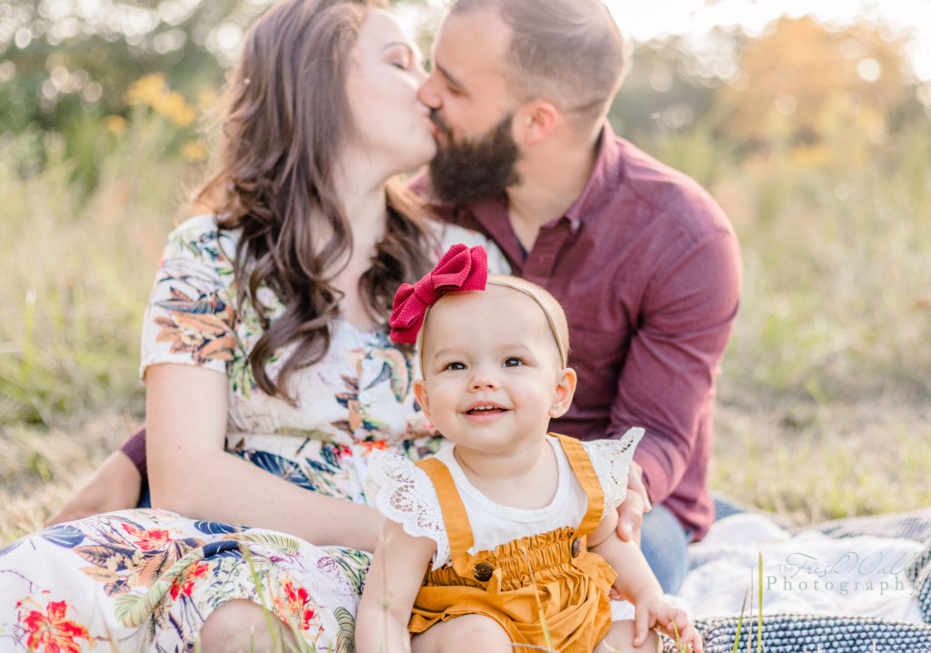 Shenandoah-Valley-family-session-portrait-family-three-fall-kiss-sweet-intimate-love-outdoor-autumn-fun-happy-sunset-mom-dad-kissing