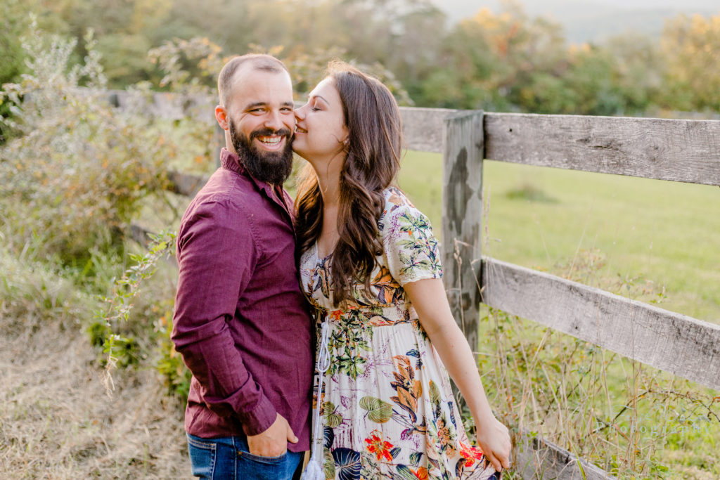 shenandoah-valley-photographer-husband-wife-happy-in-love-engagement-kissing-romantic-fall-portrait-session-virginia-photographer-natural-light